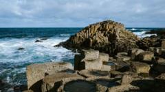 Giant’s Causeway visitors urged not to jam coins into iconic rocks