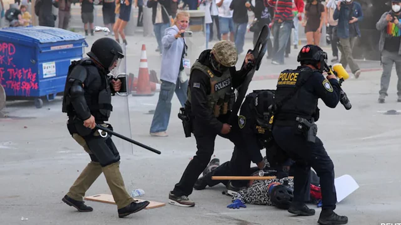 Riot Police, Anti-ICE Protesters Square Off In Los Angeles After Raids
