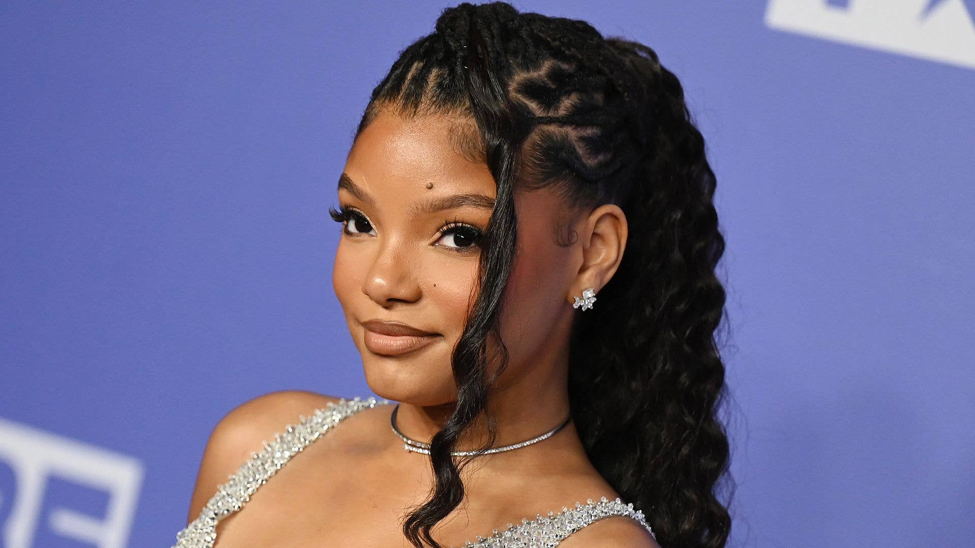 Halle Bailey stuns in tiny green bikini on birthday vacation