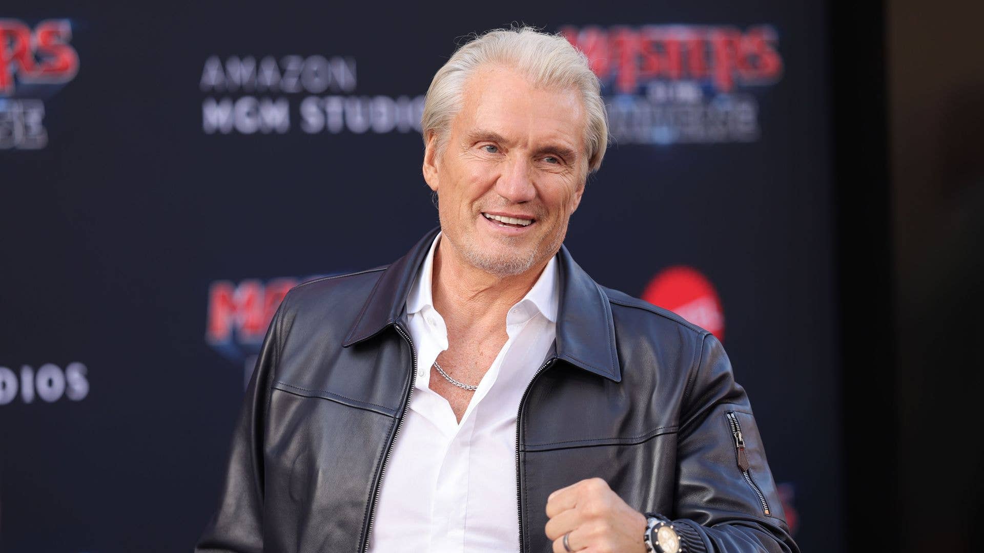 Rocky megastar, 68, enjoys rare red carpet outing with spouse, 30, and daughter, 24